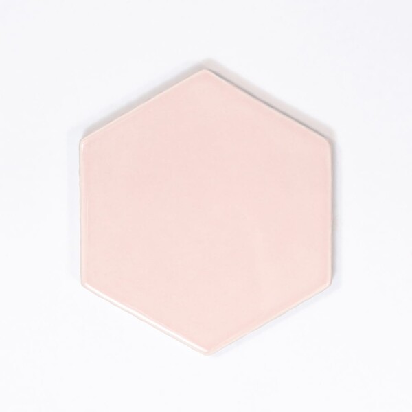 Rosie glossy hexagon ceramic tile in soft blush pink by Country Floors