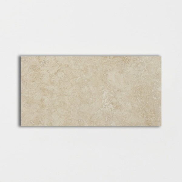 Ivory honed travertine tile smooth matte natural stone surface elegant finish by Country Floors