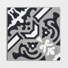 Dahlia honed cement tile with bold black and white artistic pattern by Country Floors