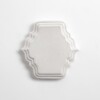 Cloud white glossy sculpted ceramic accent tile with layered detailing by Country Floors