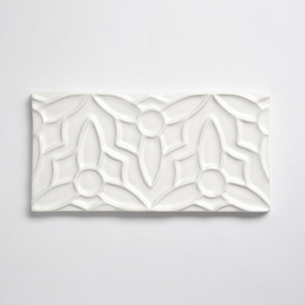 White glossy embossed ceramic accent tile for statement interiors by Country Floors