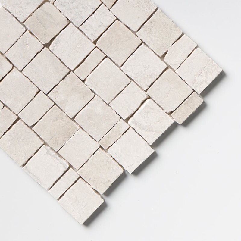 Close-up view of Diana Royal Leather Scarpa Rough Cut Marble Mosaic, highlighting the soft, low-sheen leather finish that softens the warm beige tone and golden-brown veining across the marble surface.