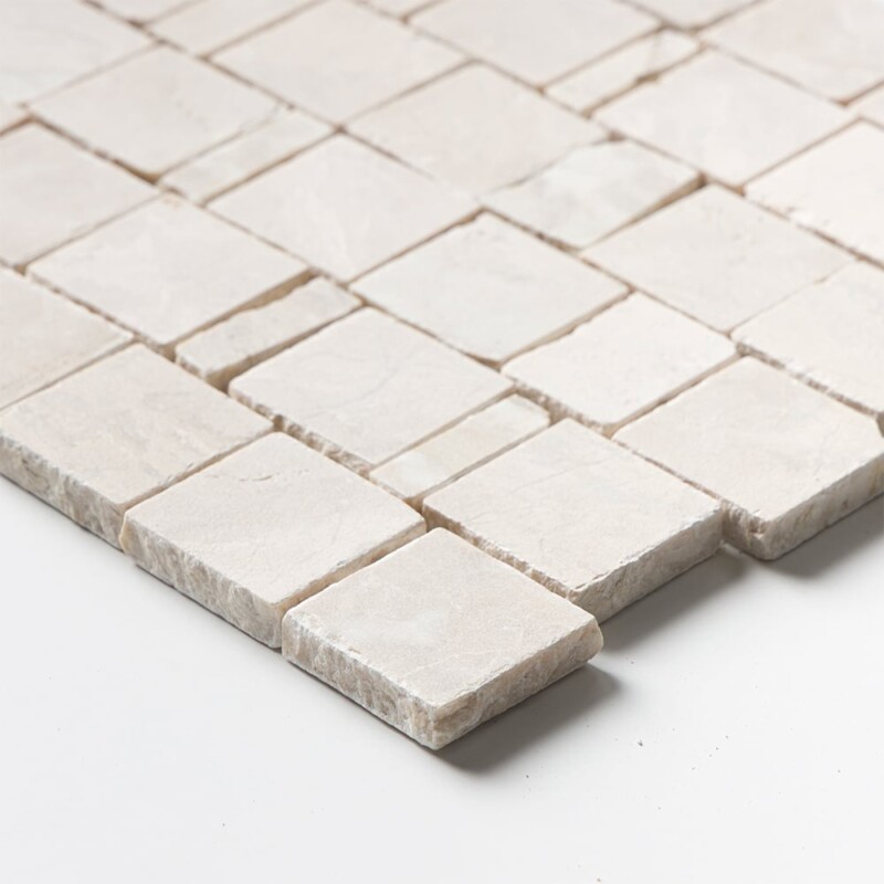Side profile of a Diana Royal Leather Scarpa Rough Cut Marble Mosaic sheet, showing the 1/2 inch tile thickness and mesh backing that holds the individual hand-clipped marble pieces together.