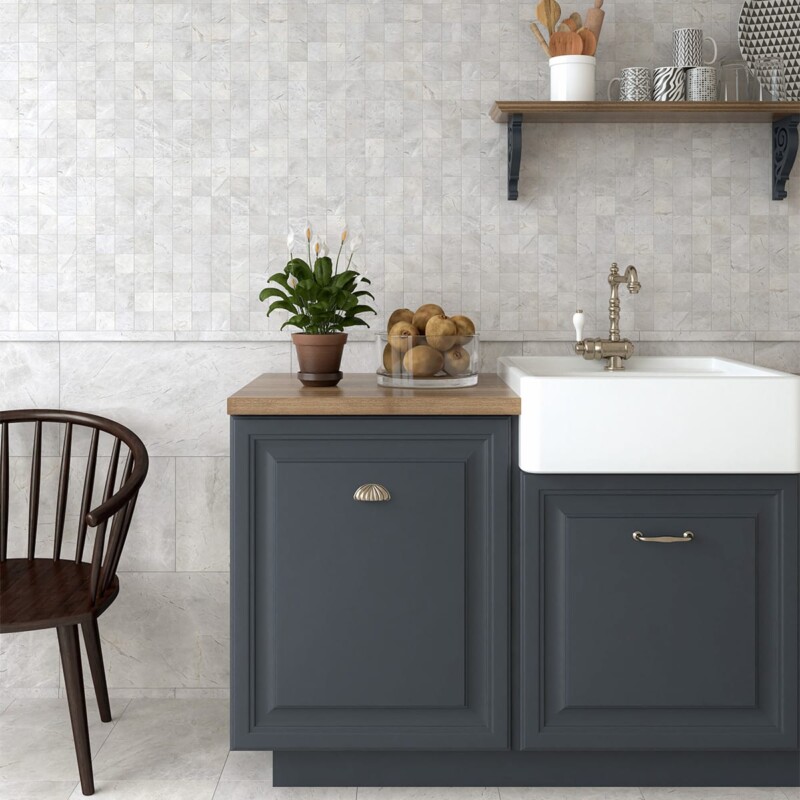Honed marble tile backsplash in a classic kitchen setting by Country Floors