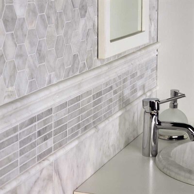 Bathroom wall with linear marble mosaic tiles and clean contemporary styling by Country Floors