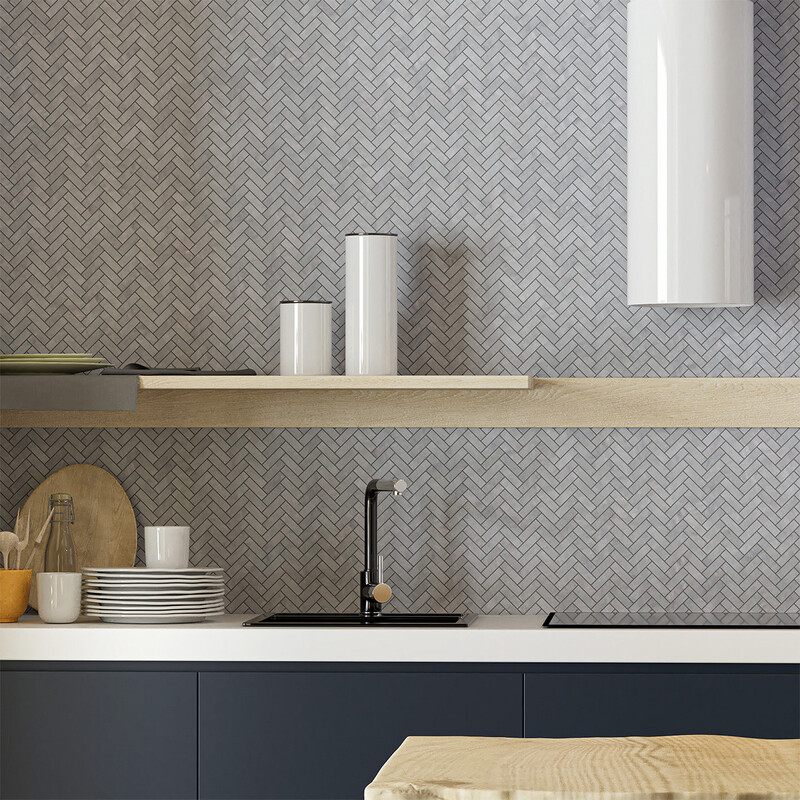 Contemporary bathroom backsplash with grey herringbone mosaic and minimalist modern styling by Country Floors