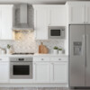 Thassos White and Skyline polished Stella marble mosaic backsplash in a luxury kitchen by Country Floors