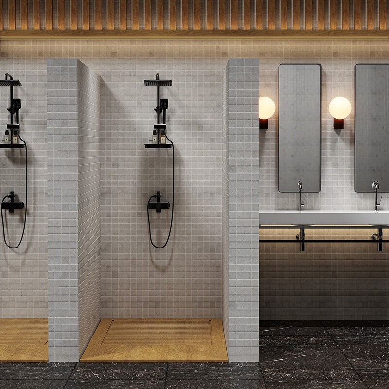 Revestimento de parede e piso do banheiro com ladrilhos de mosaico cinza 2x2, criando um visual moderno e clean, da Country Floors.