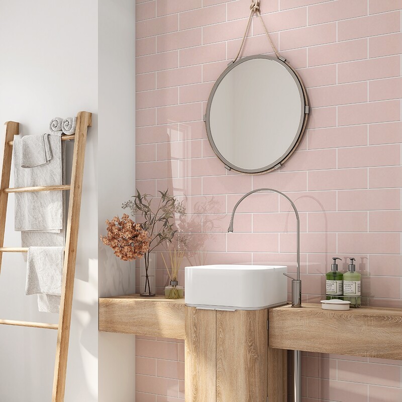 Rosie glossy subway ceramic tile wall in soft pink bathroom design by Country Floors