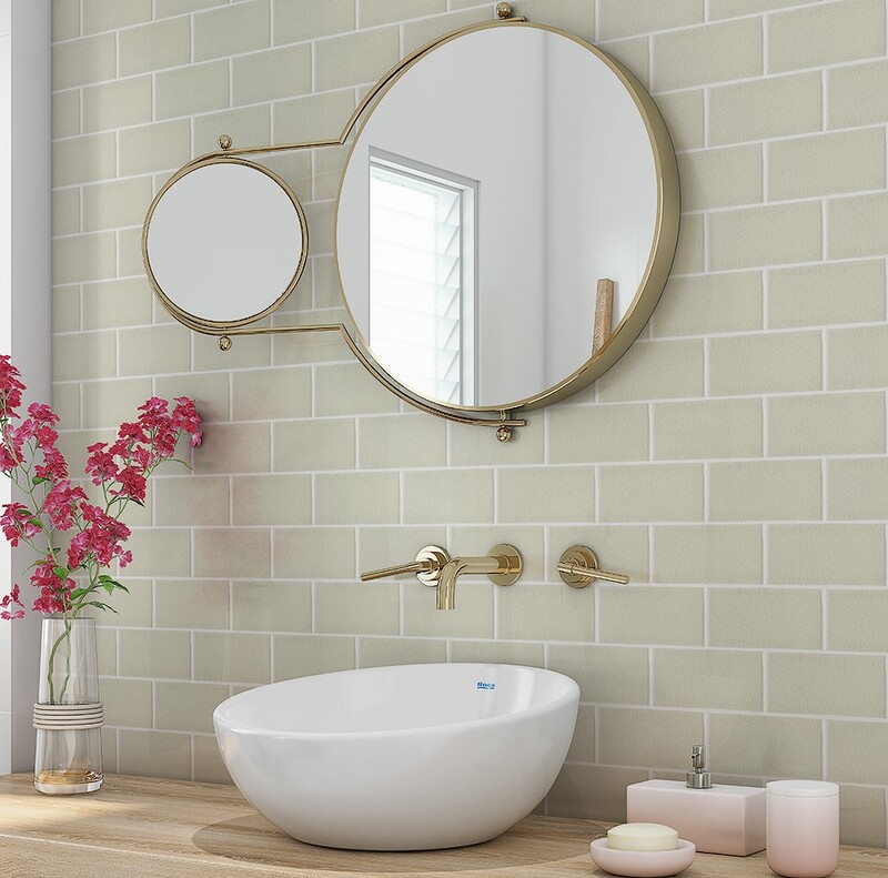 Cloud multi finish subway ceramic tile backsplash in a light modern bathroom by Country Floors