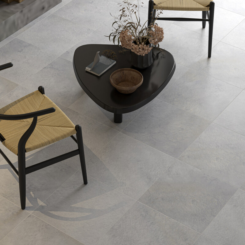 Light polished marble flooring in a modern minimalist living space by Country Floors