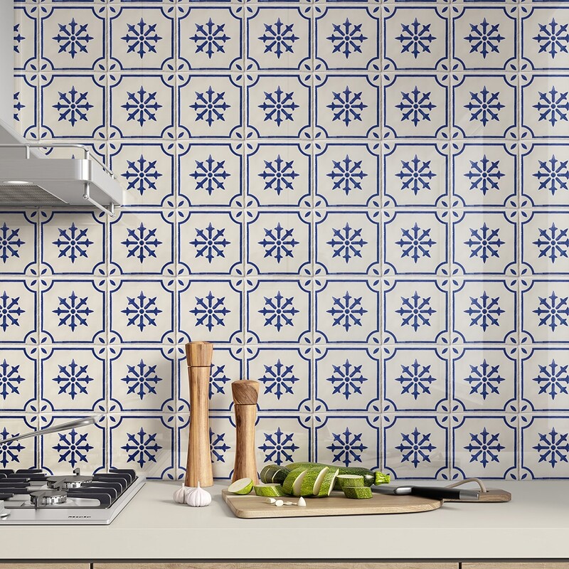 kitchen backsplash with blue white patterned tiles and warm wooden countertop styling by Country Floors