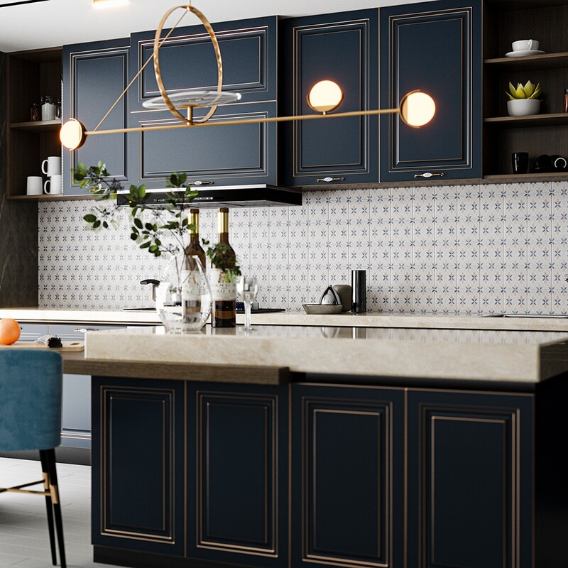 Decorative terracotta leaf pattern backsplash in a navy kitchen setting by Country Floors