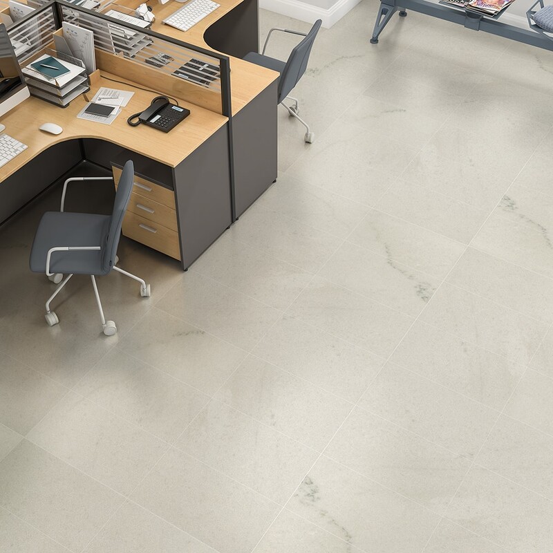 Light matte marble look porcelain floor in modern office interior by Country Floors