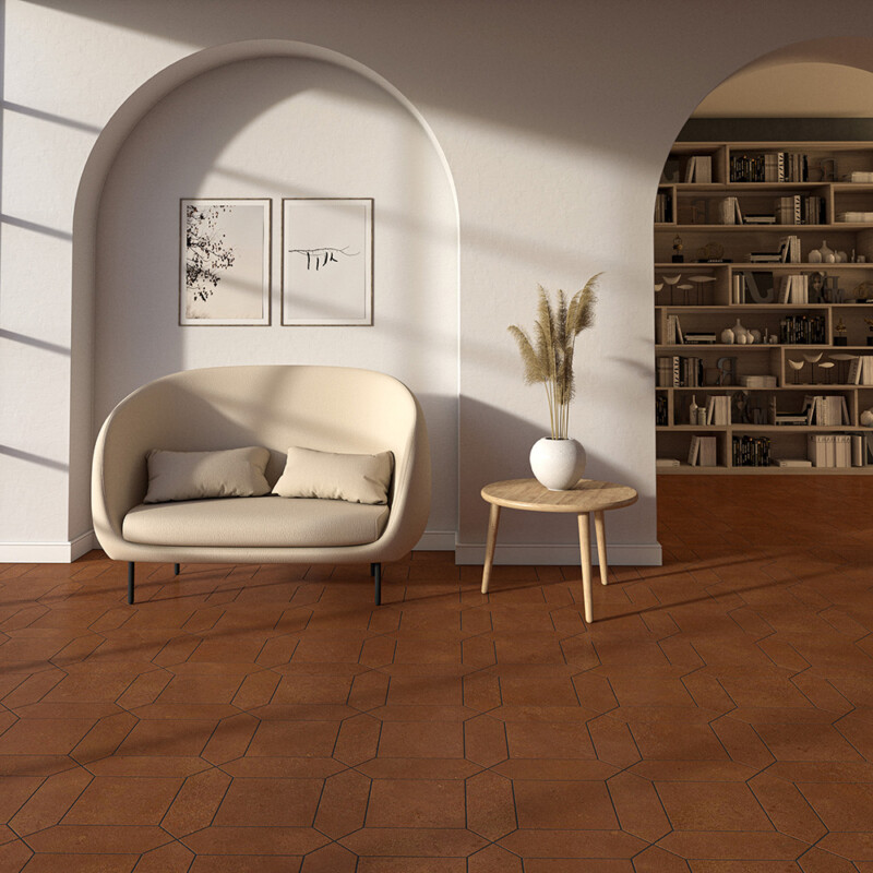 Picket terracotta tile flooring in a warm arched living space by Country Floors