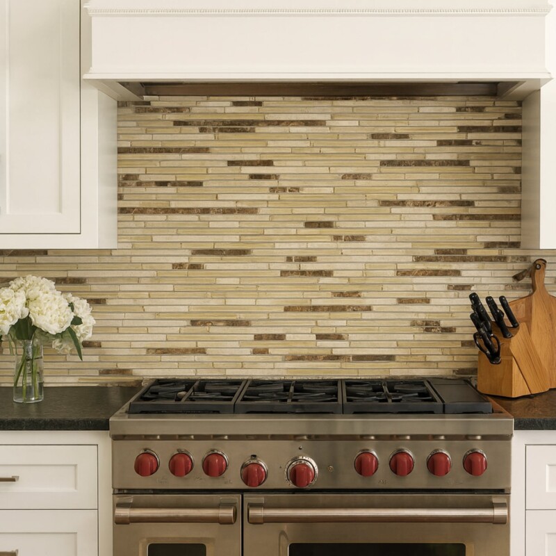 Caramelo Salado glossy liner blend glass mosaic feature wall in a luxurious modern interior litchen by Country Floors