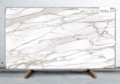 Dalle de porcelaine Calcatta Gold B Lappato Lucido 64 × 128 Image