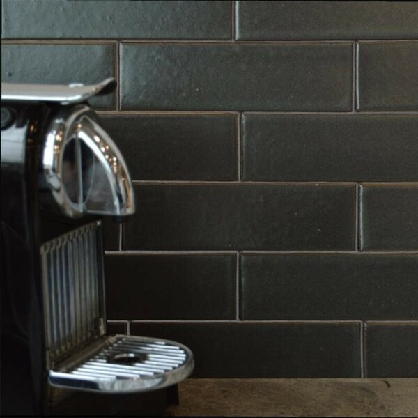 black glazed brick kitchen backsplash
