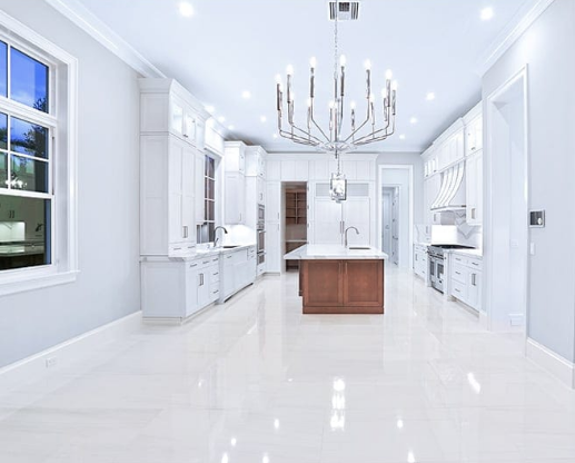 Snow White honed marble flooring in a kitchen