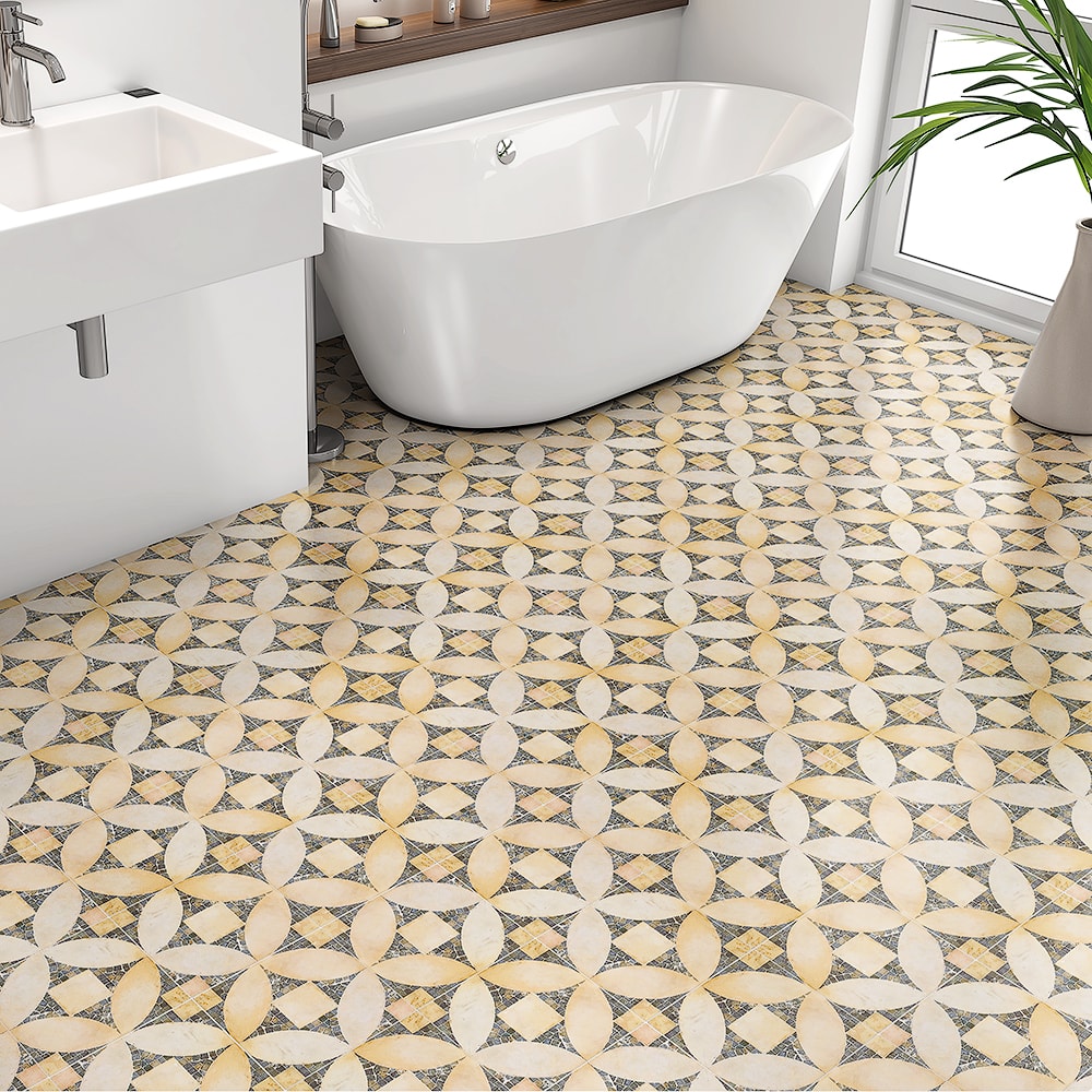 Beige and brown limestone tile mosaic on a bathroom floor. 