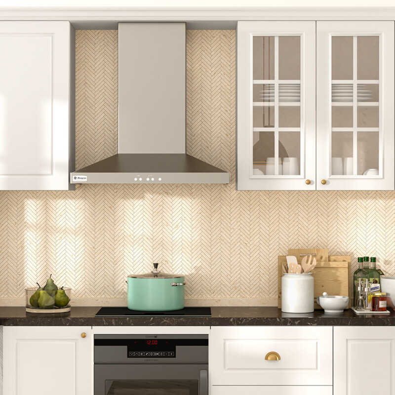 herringbone mosaic backsplash with white cabinets