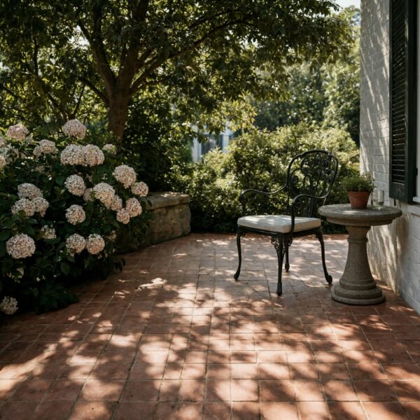 Handcrafted natural terracotta square paver tiles installed on an outdoor patio in Fairfax.