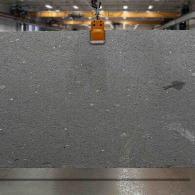A photo featuring basalt slab in a slab warehouse