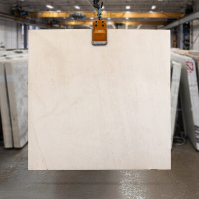 Beige marble slab showcasing in a slab yard.