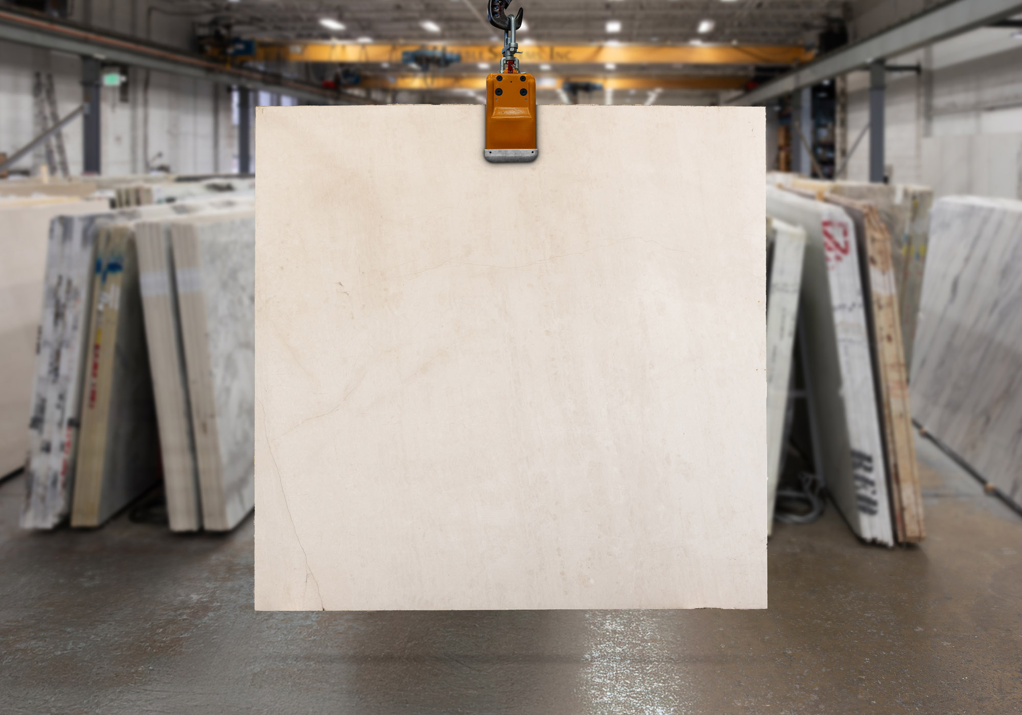 Beige marble slab showcasing in a slab yard.