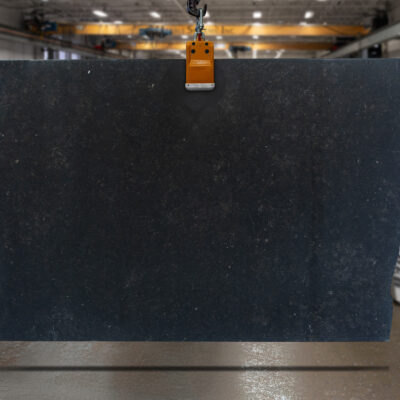 Featuring black marble slab in a slab yard.
