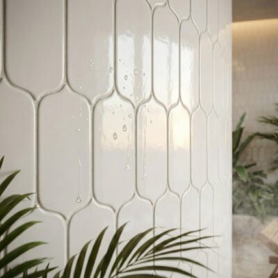 Featuring white ceramic tiles in rounded picket shape