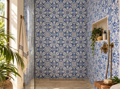 Handpainted tiles of Puerto Rico featuring a blue and white walk in shower wall.